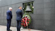 File Photo: German Foreign Minister Heiko Maas and his Polish counterpart Jacek Czaputowicz pay respect at the Wall of Remembrance as they commemorate the 75th anniversary of Warsaw Uprising at Warsaw Rising Museum in Warsaw, Poland, August 1, 2019. (Agencja Gazeta/Slawomir Kaminski via REUTERS)