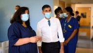 British Prime Minister Rishi Sunak speaks with members of staff as he visits Croydon University Hospital on October 28, 2022 in London, Britain. Leon Neal/Pool via REUTERS/File Photo