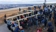 People build a barricade at Luetzerath, a village that is about to be demolished to allow for the expansion of the Garzweiler open-cast lignite mine of Germany's utility RWE, Germany, January 8, 2023. REUTERS/Thilo Schmuelgen
