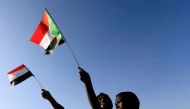 File Photo: Sudanese civilians wave their national flag as they gather at the freedom square during the first anniversary of the start of the uprising that toppled long-time ruler Omar al-Bashir, in Khartoum, Sudan, December 19, 2019. (REUTERS/Mohamed Nureldin Abdallah)