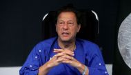 File Photo: Former Pakistan's Prime Minister Imran Khan addresses a news conference after he was wounded following a shooting incident during a long march in Wazirabad, at the Shaukat Khanum Memorial Cancer Hospital & Research Centre in Lahore, Pakistan, November 4, 2022. (REUTERS/Mohsin Raza)