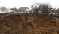 A view shows a crater left by a Russian missile, amid Russia's attack on Ukraine, in the village of Kopyliv, Kiev region, Ukraine on January 14, 2023. REUTERS/Valentyn Ogirenko