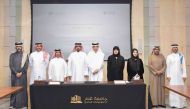 Qatar University and QNB Group officials at the MoUs signing event.