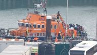 People believed to be migrants disembark a Royal National Lifeboat Institution (RNLI) lifeboat after being rescued from the English Channel while crossing from France, in Dover, Britain, on December 17, 2022. File Photo / Reuters