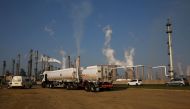 A truck is seen at South African petro-chemical company Sasol's synthetic fuel plant in Secunda, north of Johannesburg, in this picture taken March 1,2016. File Photo: Reuters/Siphiwe Sibeko.










