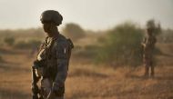 File photo: Soldiers monitor a rural area in northern Burkina Faso, along the border with Mali and Niger.(Photo by MICHELE CATTANI / AFP)

