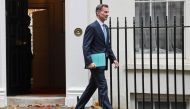 Britain's Chancellor of the Exchequer Jeremy Hunt walks at Downing Street in London, Britain, November 17, 2022. REUTERS/Toby Melville