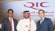 An official of Qatar Insurance Company receives the Insurer of the year in Qatar award at the MENA IR Awards 2023.
