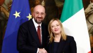 Italian Prime Minister Giorgia Meloni and European Council President Charles Michel pose for pictures during a news conference at Chigi Palace in Rome, Italy, on January 30, 2023. REUTERS/Guglielmo Mangiapane