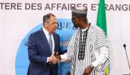 Russian Foreign Minister Sergei Lavrov and Malian Foreign Minister Abdoulaye Diop hold a joint press conference following their talks in Bamako on February 7, 2023. (Photo by RUSSIAN FOREIGN MINISTRY / AFP) 