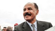 (FILE PHOTO) In this file photo taken on November 09, 2018 Eritrea's President Isaias Afwerki smiles upon his arrival at the airport in Gondar, for a visit in Ethiopia. - Eritrean President Isaias Afwerki said on February 9, 2023 that allegations of rights abuses by Eritrean troops in Ethiopia's Tigray region during the two-year war there amounted to 