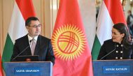 Hungarian President Katalin Novak (right) speaks during a joint press conference with the Kyrgyz President Sadyr Japarov in the presidential palace in Budapest, Hungary, on February 13, 2023. (Photo by Attila KISBENEDEK / AFP)
