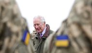 Britain's King Charles III attends a site in Wiltshire where Ukrainian recruits are being trained by British and international partner forces in south-west England on February 20, 2023. (Photo by Chris Jackson / AFP)