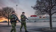 File Photo: Soldiers from Gotland's regiment patrol Visby harbour, amid increased tensions between NATO and Russia over Ukraine, on the Swedish island of Gotland, Sweden, 13 January 2022. (TT News Agency/Karl Melander via REUTERS)