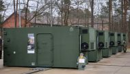 Containers with tank simulators of the German Army (Bundeswehr) are pictured at the Armoured Corps Training Centre (Panzertruppenschule) in Munster, northern Germany, on February 20, 2023.  Photo by FOCKE STRANGMANN / AFP