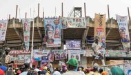 People enter Teslim Balogun Stadium during a rally for the All Progressives Congress (APC) presidential candidate Bola Ahmed Tinubu in Lagos on February 21, 2023 ahead of the Nigerian presidential election scheduled for February 25, 2023. (Photo by Patrick Meinhardt / AFP)