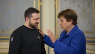 This handout picture taken and released by the Ukrainian Presidential press service on February 20, 2023 shows Ukrainian President Volodymyr Zelensky welcoming International Monetary Fund Managing Director Kristalina Georgieva for a meeting in Kyiv, amid the Russian invasion of Ukraine. (Photo by Handout / UKRAINIAN PRESIDENTIAL PRESS SERVICE / AFP) 