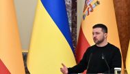 Ukrainian President Volodymyr Zelensky speaks during a joint press conference with Spain's Prime Minister following their talks in Kiev on February 23, 2023.  (Photo by Sergei SUPINSKY / AFP)