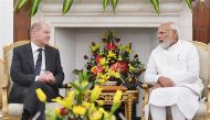 This handout photo taken and released by Indian Press Information Bureau (PIB) on February 25, 2023 shows India's Prime Minister Narendra Modi meeting with German Chancellor Olaf Scholz in New Delhi. (Photo by PIB / AFP) 