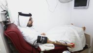 A QLM personnel donating blood during the campaign.
