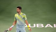 Serbia's Novak Djokovic reacts during his Dubai Duty Free Tennis Championship match against Netherlands' Tallon Griekspoor in Dubai on March 1, 2023. (Photo by Karim SAHIB / AFP)