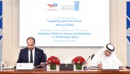 Dr. Salem Al Naemi, (right) President of UDST, and Matthieu Bouyer, Country Chair, TotalEnergies Qatar and Managing Director, TotalEnergies EP Qatar, signing the agreement.