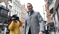 Former England cricket captain Michael Vaughan arrives to attend a Cricket Discipline Commission hearing, relating to allegations of racism at Yorkshire County Cricket Club, in London on March 2, 2023. (Photo by JUSTIN TALLIS / AFP)