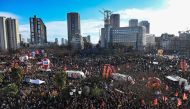 In this file photo taken on January 31, 2023, protesters gather at Place d'Italie square for a rally on a second day of nationwide strikes and protests over the government's proposed pension reform, in Paris. - France braces for major transport blockages, with mass strikes and protests set to hit the country on March 7 in objection to the planned boost of the age of retirement from 62 to 64. (Photo by Alain JOCARD / AFP)