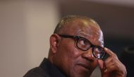 Nigeria Labour Party Presidential Candidate, Peter Obi, adjust his glasses during a press briefing on the outcome of the 2023 Nigeria presidential and general election in Abuja on March 2, 2023. (Photo by KOLA SULAIMON / AFP)