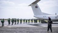 Burundian military personnel arrive at Goma airport in eastern Democratic Republic of Congo on March 5, 2023. (Photo by ALEXIS HUGUET / AFP)