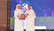 Group Chief Administrative Officer of QIC Rashid Al Buainain receives the award.
