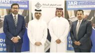 Officials of Essa Al Sulaiti Law Firm and JAR Accounting and Auditing during the agreement signing event.