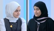 Screen grab of students Rana (left) and Maha speaking to Qatar TV  