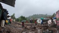 People repatriate residents and their property from a flood affected Chimwankhunda location in Blantyre on March 14, 2023 following heavy rains caused by cyclone Freddy. (Photo by Amos Gumulira / AFP)