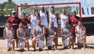 Qatar beach handball team players and officials.