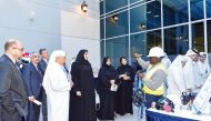 UDST President Dr. Salem Al Naemi and other officials listen to a presentation during the Skills Day event.