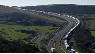 Freight lorries and HGVs (heavy goods vehicles) queue on the A20 road towards the Port of Dover on the south-east coast of England. File photo / AFP