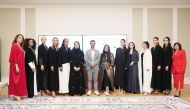 Qatar-based entrepreneurs, designers and models pose with Gills Manjulakshmi (seventh right) who hosted ‘Creative Fashion Forces by Women’.