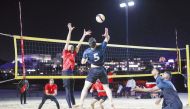 Players in action during Katara Ramadan Beach Volleyball Championship.