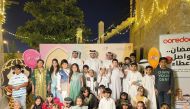 Children with officials at a Garangao event.