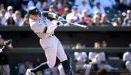 Aaron Judge #99 of the New York Yankees hits a home run in the eighth inning against the Baltimore Orioles at Oriole Park at Camden Yards on April 09, 2023 in Baltimore, Maryland. (Photo by Greg Fiume / GETTY IMAGES NORTH AMERICA / Getty Images via AFP)
