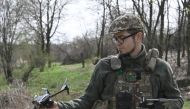 Ukrainian serviceman Oleksandr, a drone pilot of the 5 Separate Assault Brigade, attends a training exercise in the Donetsk region on April 7, 2023, amid the Russian invasion of Ukraine. (Photo by Genya Savilov / AFP)