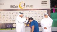 Ashghal President Dr. Eng Saad bin Ahmad Al Muhannadi (right) and Public Relations and Communications Department Manager Abdulla Saad Al Saad while honouring the winners of Ashghal 10th Ramadan Tournament competitions 2023.