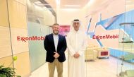 Dr. David Palandro, Vice President and Research Director at EMRQ, (left) with an official during the QSTP Meet The Expert session.