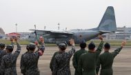A Japan Air Self-Defense Force C-130 transport plane departs for Djibouti in preparation for the evacuation of Japanese nationals from Sudan, at the Komaki Air Base in Aichi prefecture on April 21, 2023. (Photo by JIJI Press / AFP) / Japan OUT
