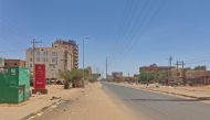 A deserted street is pictured in Khartoum on May 1, 2023 as deadly clashes between rival generals' forces have entered their third week. Photo by AFP