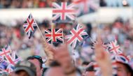 Crowds gather inside Windsor Castle grounds ahead of the Coronation Concert, in Windsor, west of London on May 7, 2023. Photo by Chris Jackson / POOL / AFP