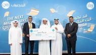 The New Misk Millionaire receives the prize from QIB’s representatives.