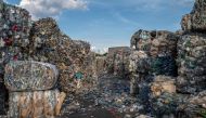 This picture shows plastic bottles at a Recycle Factory in the city of Megara near Athens, on May 26, 2023. (Photo by Angelos Tzortzinis / AFP)