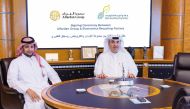 President and CEO of Alfardan Group Omar Hussain Alfardan (right) during the signing of MoU.